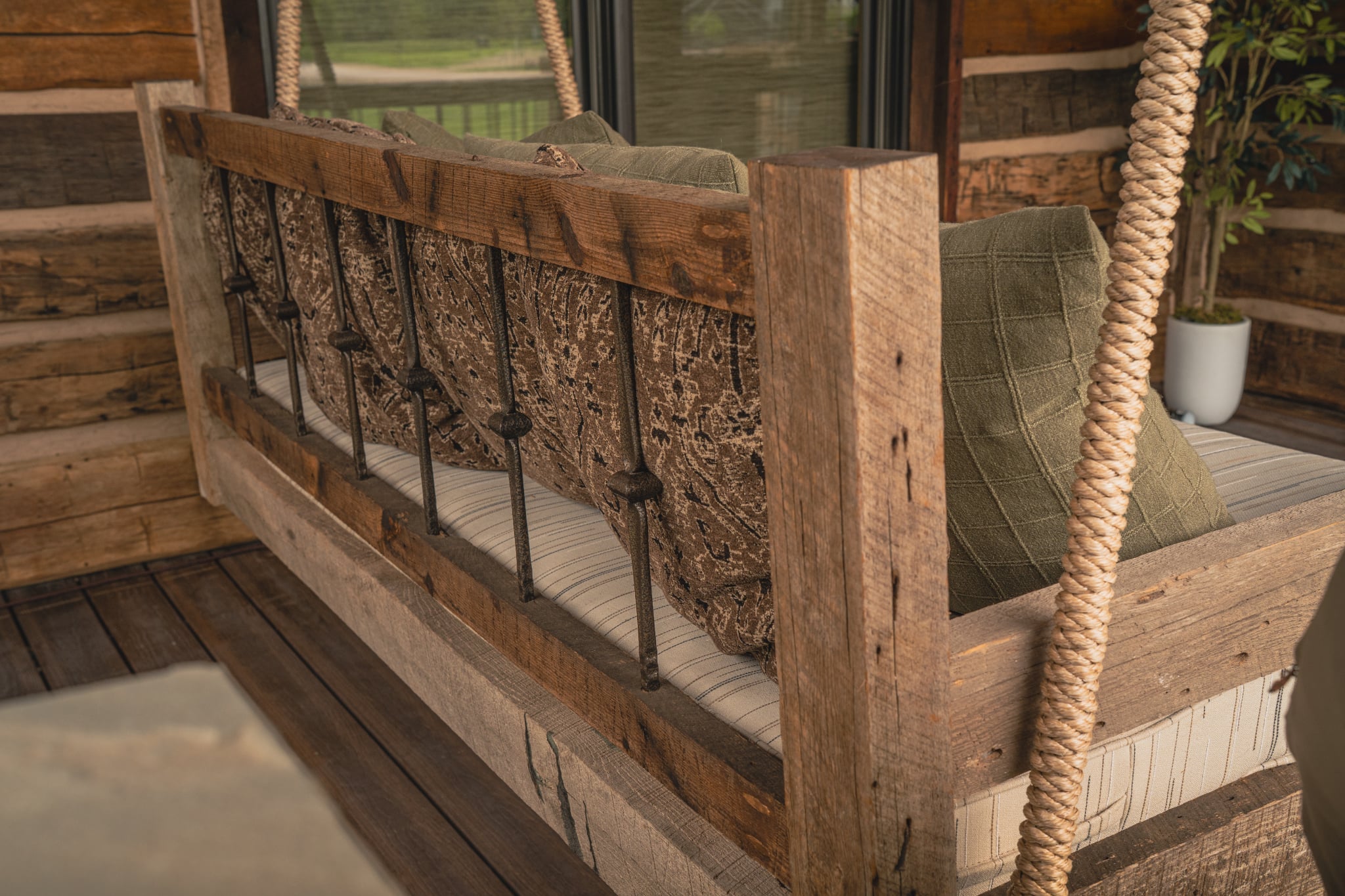 Reclaimed Hardwood Swing with custom metal back. 