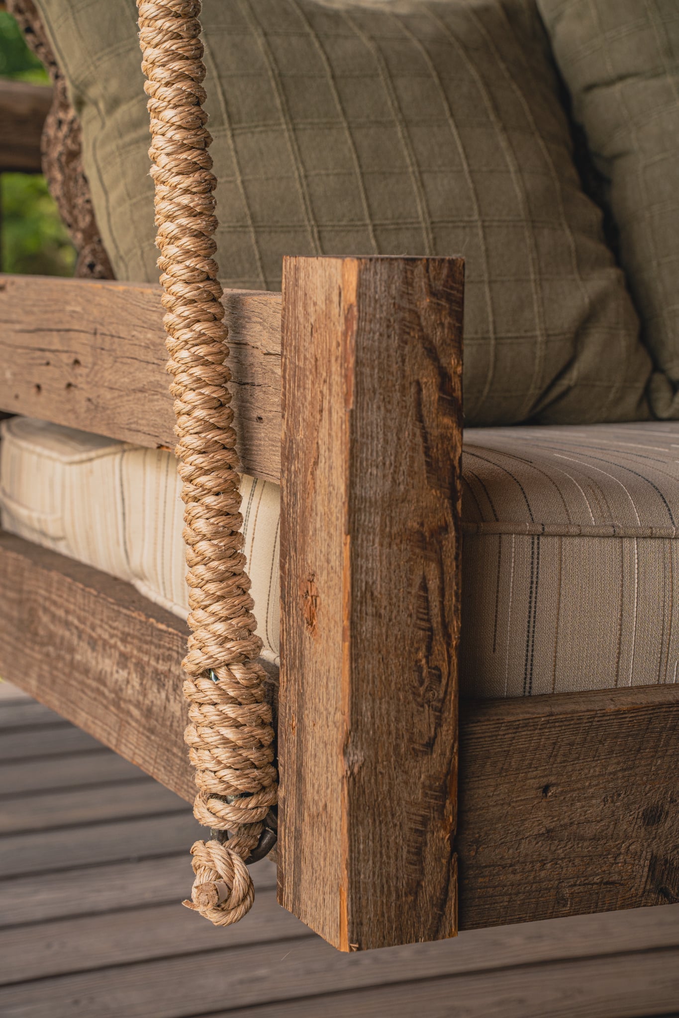 Close-up of Lakosky swing bed front corner showcasing Rope Wrapped Chain and reclaimed hardwood frame detail