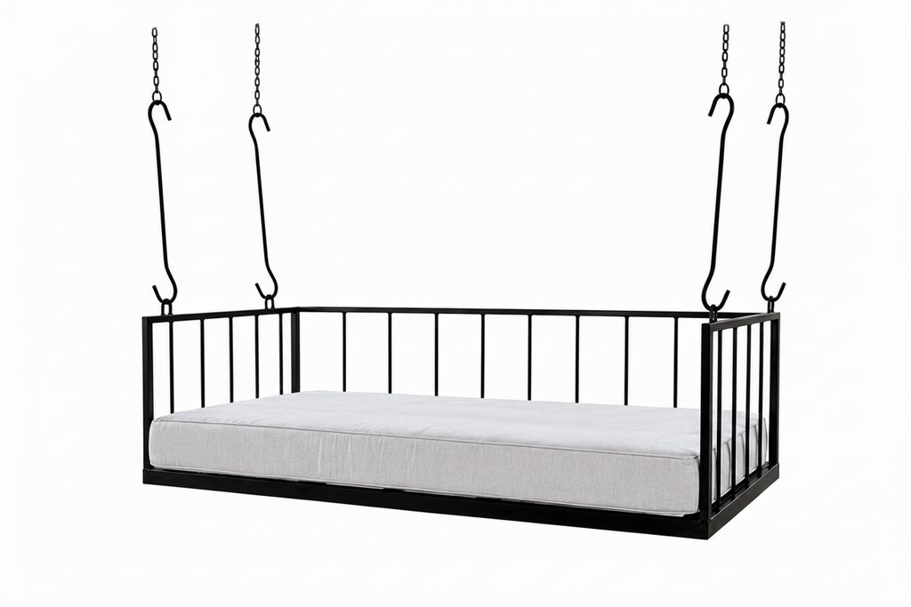 Black metal swing bed with white mattress on a white background
