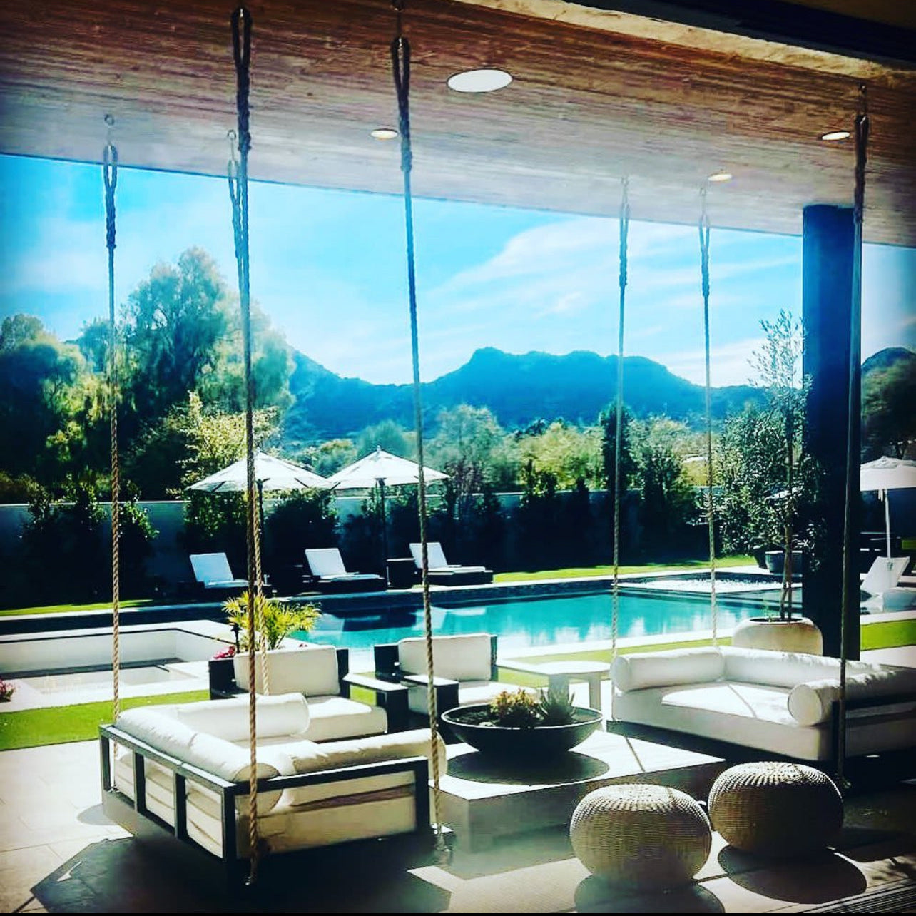 Nate and Lane’s Bre Canyon in Paradise Valley Arizona. Shown with black frame and Sunbrella Canvas Natural Fabric 