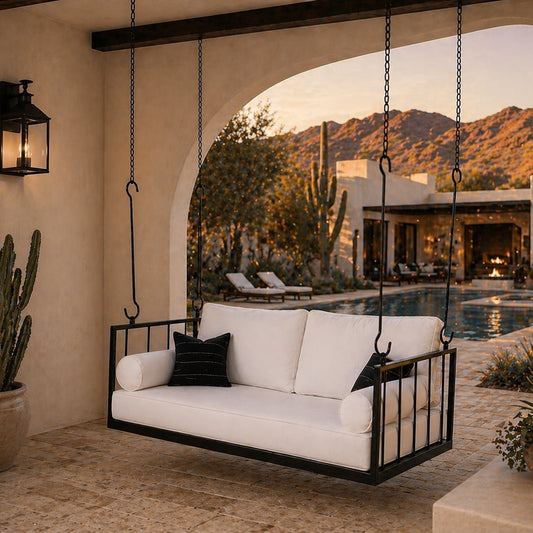 Outdoor swing bed with Sunbrella cushions in an Arizona  patio setting with mountains in the background.